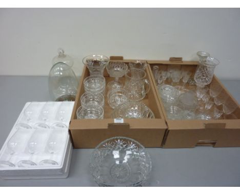 Stuart crystal bowls, drinking glasses, glass oil lamp smoke bell, two glass domes, and other glassware in two boxes