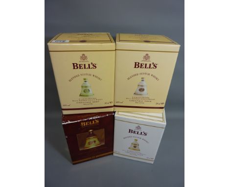 Four limited edition Bells Christmas Scotch Whisky decanters 1996, 2007, 2008, 2009