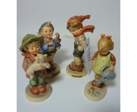 Four Hummel figures