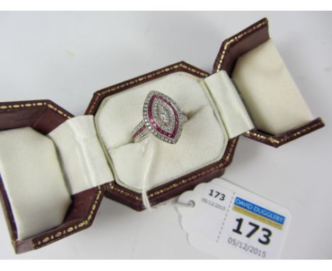 Dress ring set with cubic zirconia and ruby coloured stones stamped 925