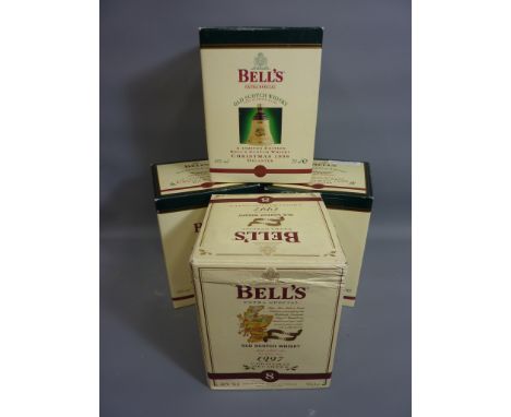 Four limited edition Bells Christmas Scotch Whisky decanters 1997, 1998 x3