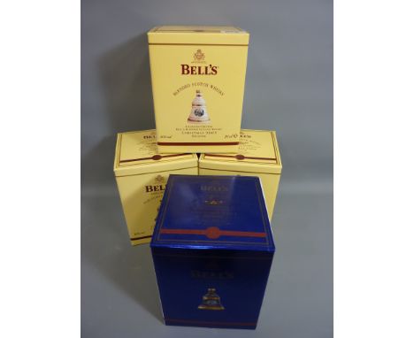 Four limited edition Bells Christmas Scotch Whisky decanters 2003, 2004,2005, 2006
