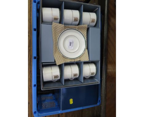 A cased set of six Wedgwood House of Commons coffee cans and saucers and various Royal Worcester Evesham gold pattern tablewa