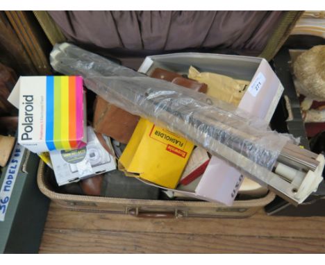 Various Polaroid cameras and various other camera equipment