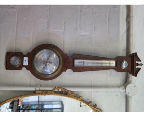 A mahogany and ebony strung banjo barometer by Comitti of London, with swan neck pediment, thermometer and hygrometer 68cm hi