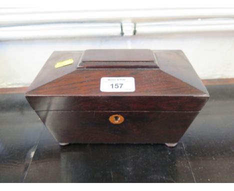 A 19th century rosewood sarcophagus form tea caddy on pad feet, 20cm wide
