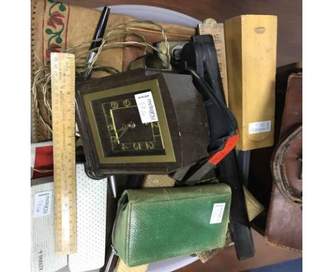 LOT OF COLLECTABLESincluding a clock, a leather case, vintage rules, pens, etc.