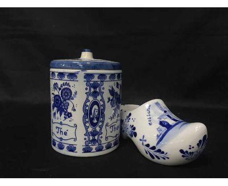 LOT OF MIXED BLUE AND WHITE CERAMICSincluding clogs and jars with Delft and Carlton ware examples, also a pair of wooden Holl