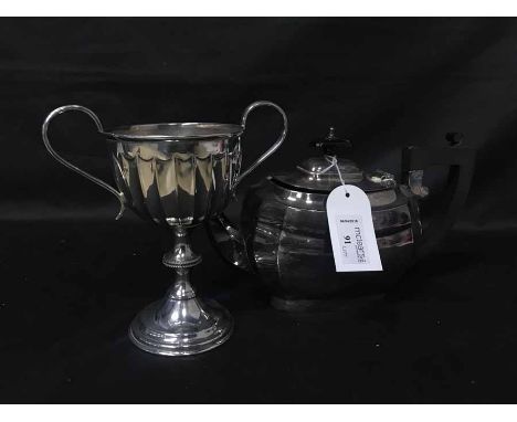 LOT OF SILVER PLATEincluding a tea service, two cake baskets and pair of trophies