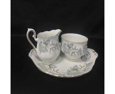 ROYAL ALBERT TEA SERVICE IN 'SILVER MAPLE' PATTERNcomprising twelve trios, two sandwich plates, two sugar and two cream