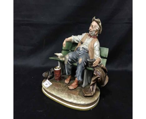 THREE CAPODIMONTE STYLE FIGUREStogether with ceramic cars