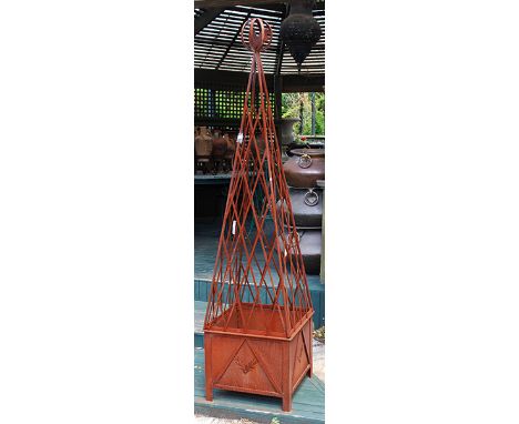 A PAIR OF IRON LATTICE OBELISKS WITH POTS
each obelisk topped with an openwork sphere with a silhouette rooster, within a squ