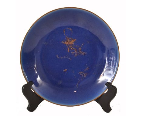 A CHINESE BLUE-GLAZED DRAGON DISH, QIANLONG MARK

with design of dragon gilded to the interior of the plate, the reverse side