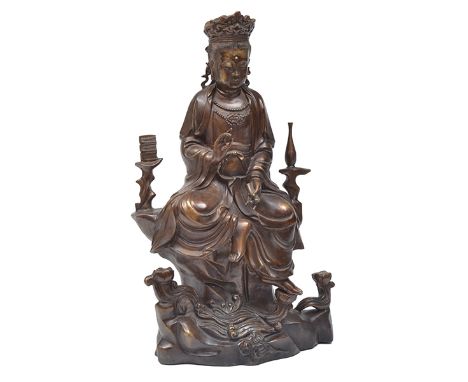 A CHINESE CAST IRON FIGURE OF GUAN YIN
Ming dynasty (1368-1644)
adorned with a foliate diadem, a dhoti draped across her shou
