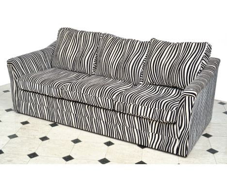 A CONTEMPORARY THREE SEAT SOFA UPHOLSTERED IN  ZEBRA STRIPE FABRIC

195cm long

