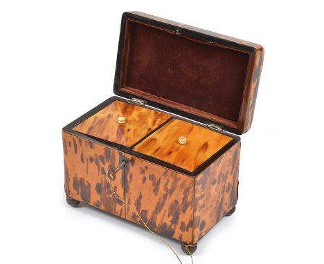A VICTORIAN TORTOISESHELL VENEERED TEA CADDY rectangular with rounded edges, silver inlay stringing and vacant cartouche to l