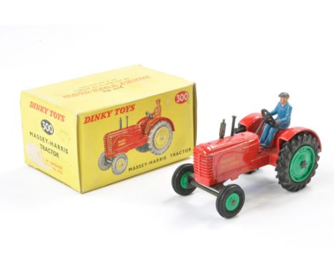 Dinky No. 300 Massey Harris Tractor. Red with blue driver and green hubs. Massey Ferguson decals. Generally very good, a few 