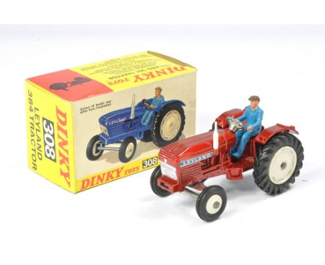 Dinky No. 308 Leyland 384 Tractor. Metallic red with white hubs. Excellent with very little sign of wear in very good box. 