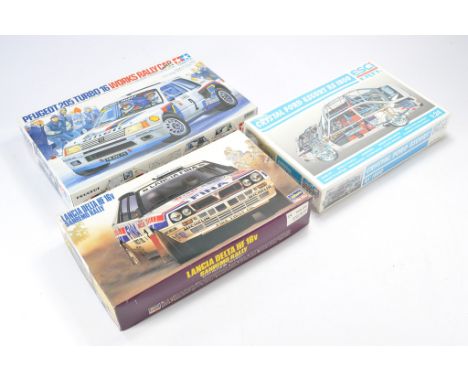 A trio of 1/24 scale Model Racing Car Kits comprising Esci Ertl Crystal Ford Escort RS 1800 - outer seal, Hasegawa Lancia Del