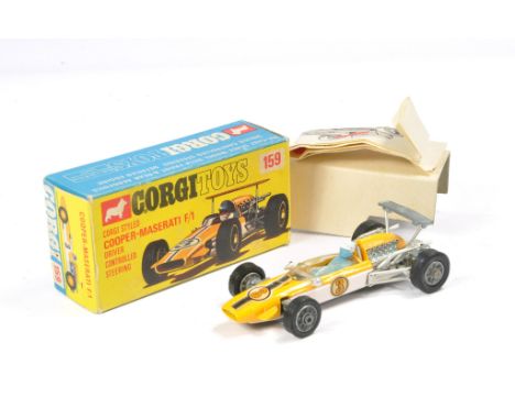Corgi No. 159 Cooper Maserati F1 Racing Car. Generally excellent with very little sign of wear, the odd tiny speck. In very g