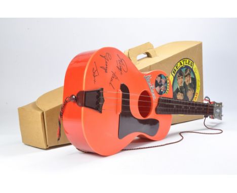 Beatles New Beat Toy acoustic Guitar by Selcol (England). Approx 80cm long complete with four strings and tuning pegs. Genera