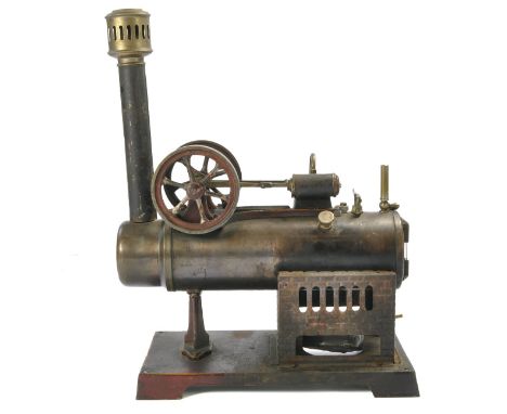 An old horizontal stationary steam engine, German maker, Doll et Cie. In well used condition and likely requires some refurbi