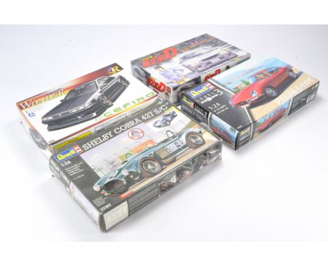 A group of 1/24 scale Model Cars and Racing Kits comprising Aoshima  Car Modify Wonder A31 CEFIRO, Fujimi SX10 Altezza, Revel