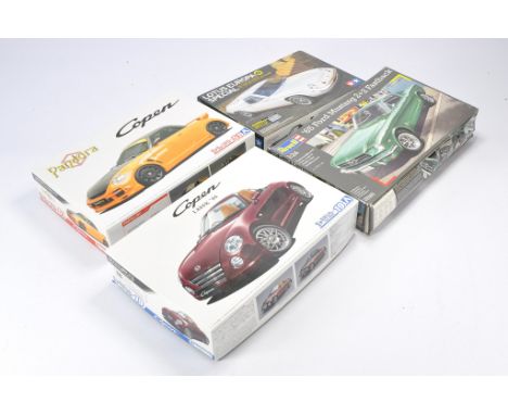 A group of 1/24 scale Model Cars and Racing Kits comprising Aoshima Pandora Type887 EVOII, Aoshima Copen L880K 06, Revell '65