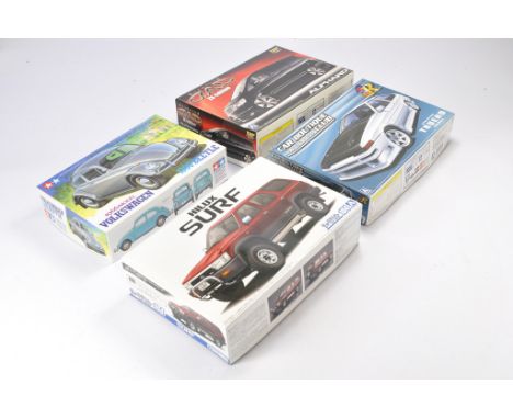 A group of 1/24 scale Model Cars and Racing Kits comprising Tamiya Volkswagen 1300 Beetle, Aoshima Garson D.D.D. ZX Edition, 