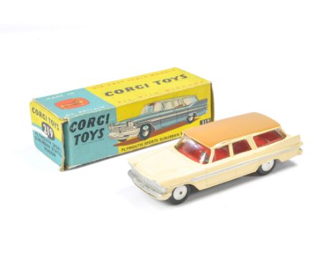 Corgi No. 219 Plymouth Sports Suburban Station Wagon. Cream / light brown with red interior. Excellent with very little sign 