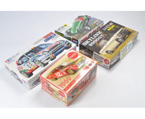 A group of 1/24 scale Model Cars and Racing Kits comprising Tamiya Lotus Super 7 Series II, Fujimi Skyline 2000GT, Tamiya Cor