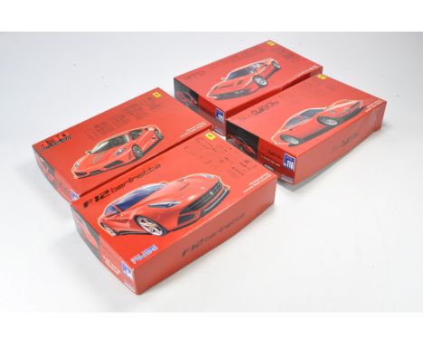 A group of 1/24 scale Model Cars and Racing Kits comprising, Fujimi 430 Scuderia, Fumimi GTO, Fujimi Dino 246G, Fujimi F12 Be