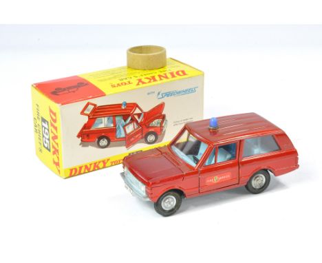 Dinky No. 195 Land Rover Fire chief's car. Metallic red with light blue interior. Excellent with very little sign of wear in 