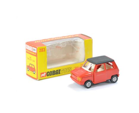 Corgi No. 283 OSI 'DAF City' Car. Red with white interior. Excellent with very little sign of wear. In excellent box. A very 