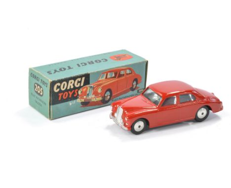 Corgi No. 205 Riley Pathfinder Saloon. Red with silver trim. Generally excellent, a couple of chips and minor rubs. In very g