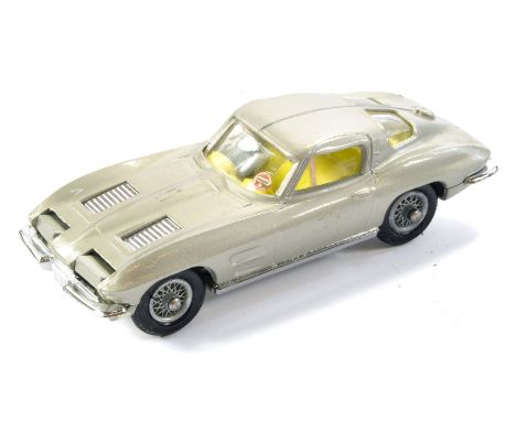 Corgi No. 310 Chevrolet Corvette. Silver with lemon interior. Very good to excellent with the odd minor mark. 