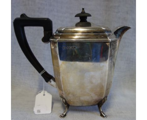 A SILVER TEAPOT, with ebony handle and finial