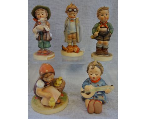 A COLLECTION OF FIVE HUMMEL/GOEBEL FIGURES, 'Doctor', 'Joyful', 'Trumpet Boy', 'The Lost Sheep' and a girl with chicks