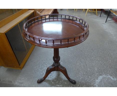 A Chippendale Revival mahogany gallery top tripod table 