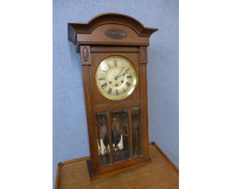 A 19th Century mahogany wall clock, movement stamped D.R.G. 