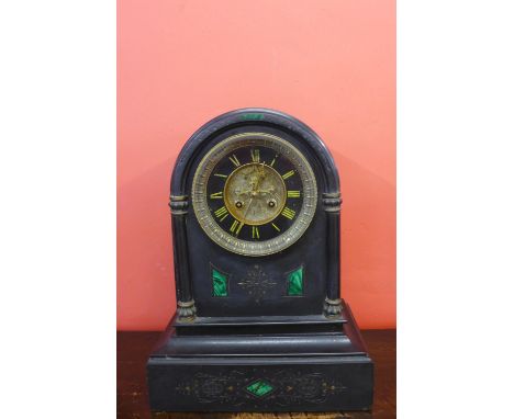 A large 19th Century French Belge noir and malachite set mantel clock 
