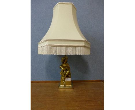 A gilt metal figural cherub table lamp 