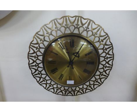 A West German Eurastyle brass circular wall clock
