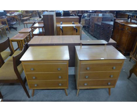 A light oak chest of drawers and dressing chest 