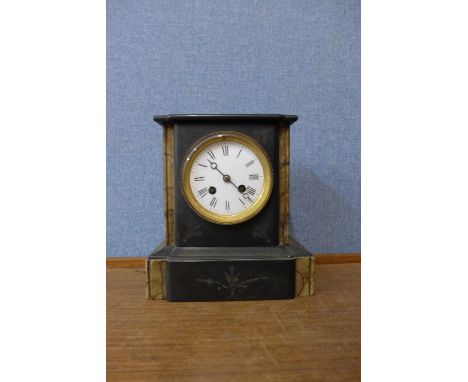 A 19th Century French Belge noir mantel clock 