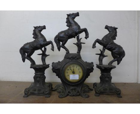 A French Art Nouveau spelter clock garniture 