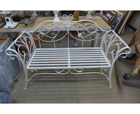 A painted metal garden bench 