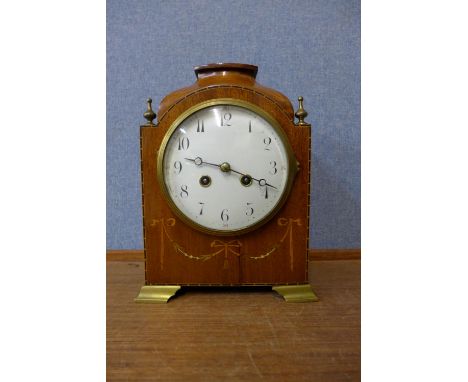 An early 20th Century inlaid mahogany mantel clock 