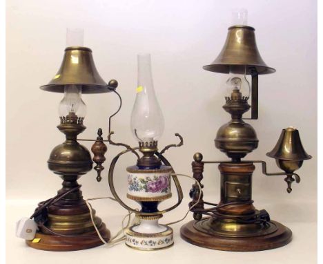 Three reproduction pseudo oil lamp. Condition report: see terms and conditions