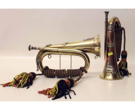Welsh regiment bugle, 1944 and a Lincolnshire regiment bugle (2). Condition report: see terms and conditions